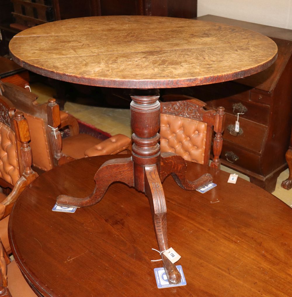 A 19th century oak circular tripod tea table, diameter 84cm